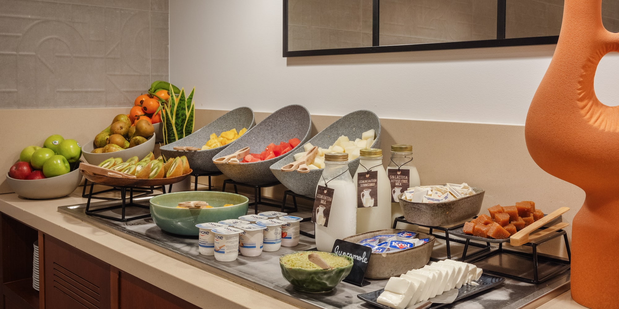 a buffet table with different food items on it