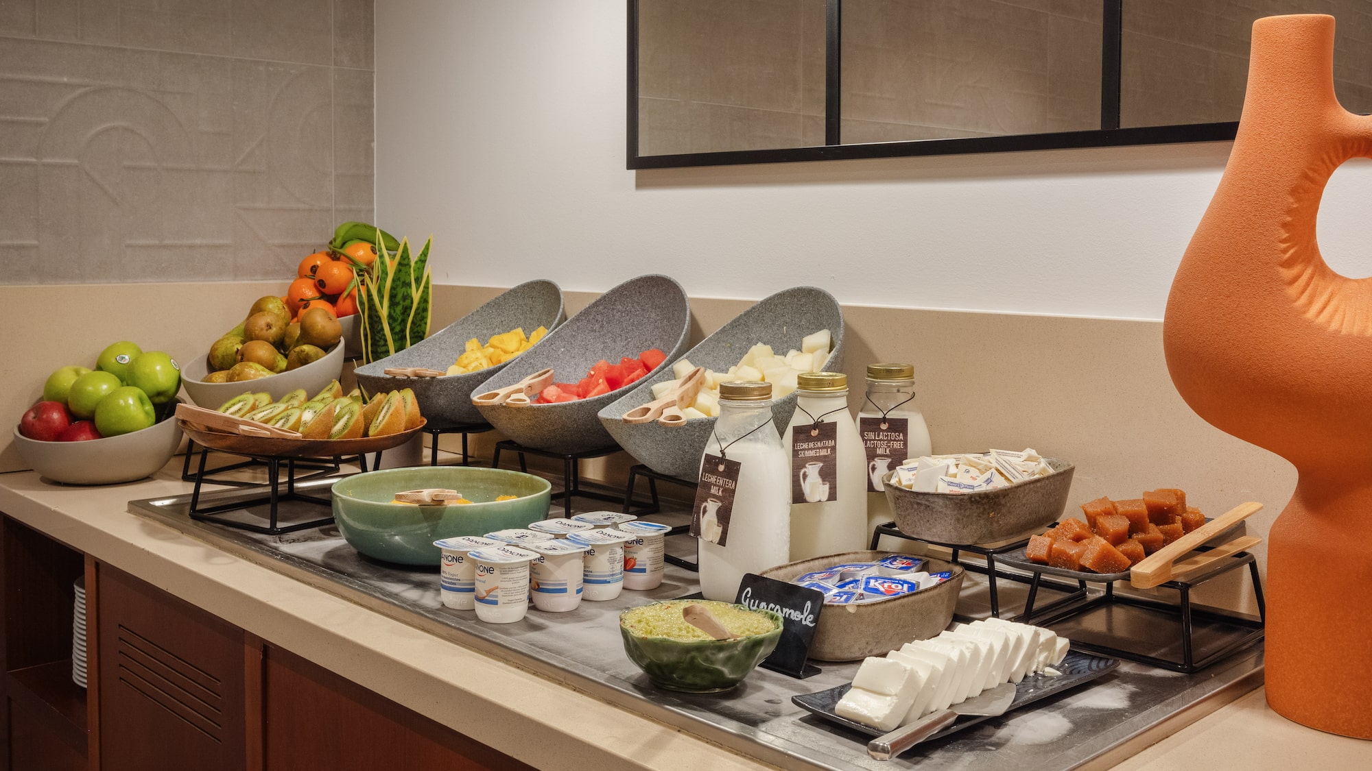 a buffet table with different food items on it