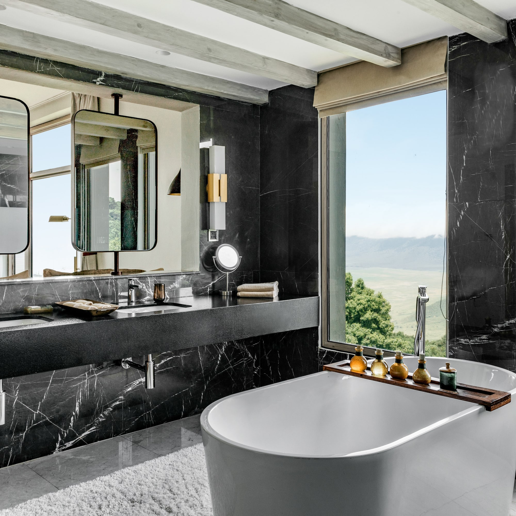 a bathroom with a tub and a sink