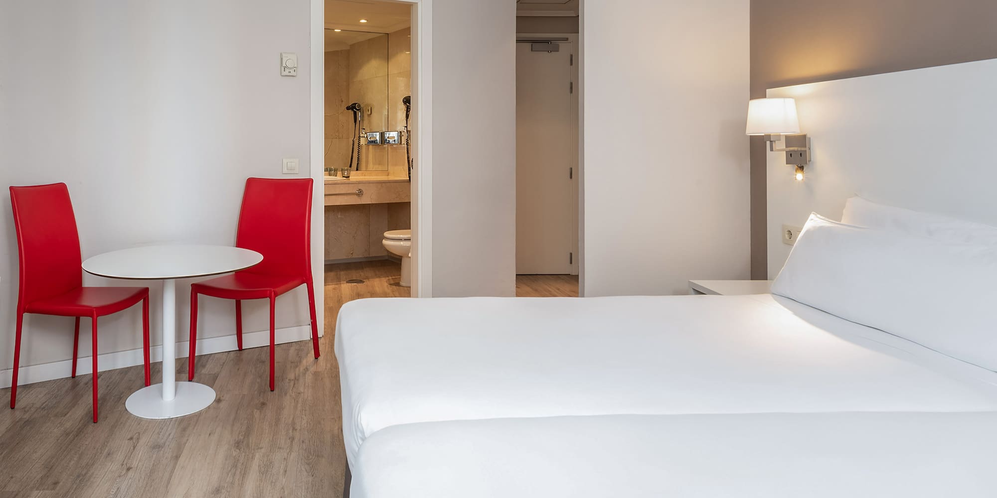 a room with a table and chairs