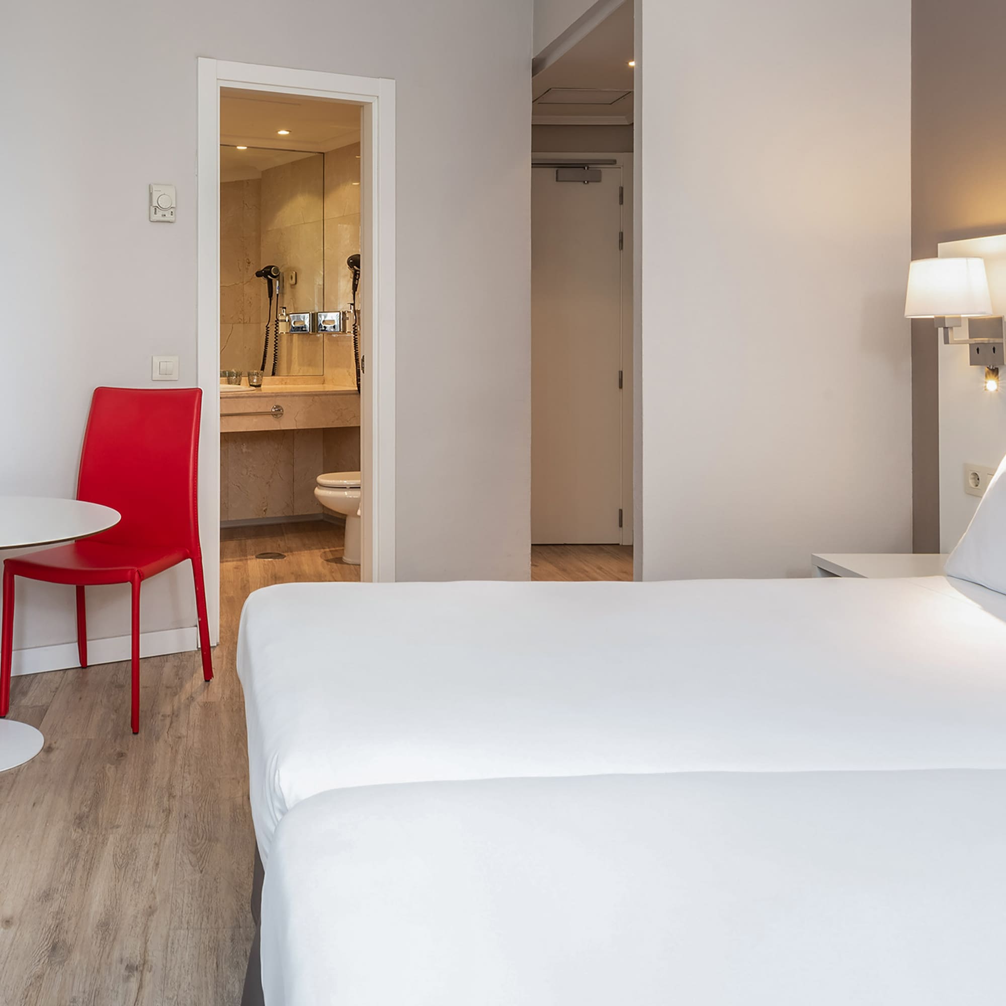 a room with a table and chairs