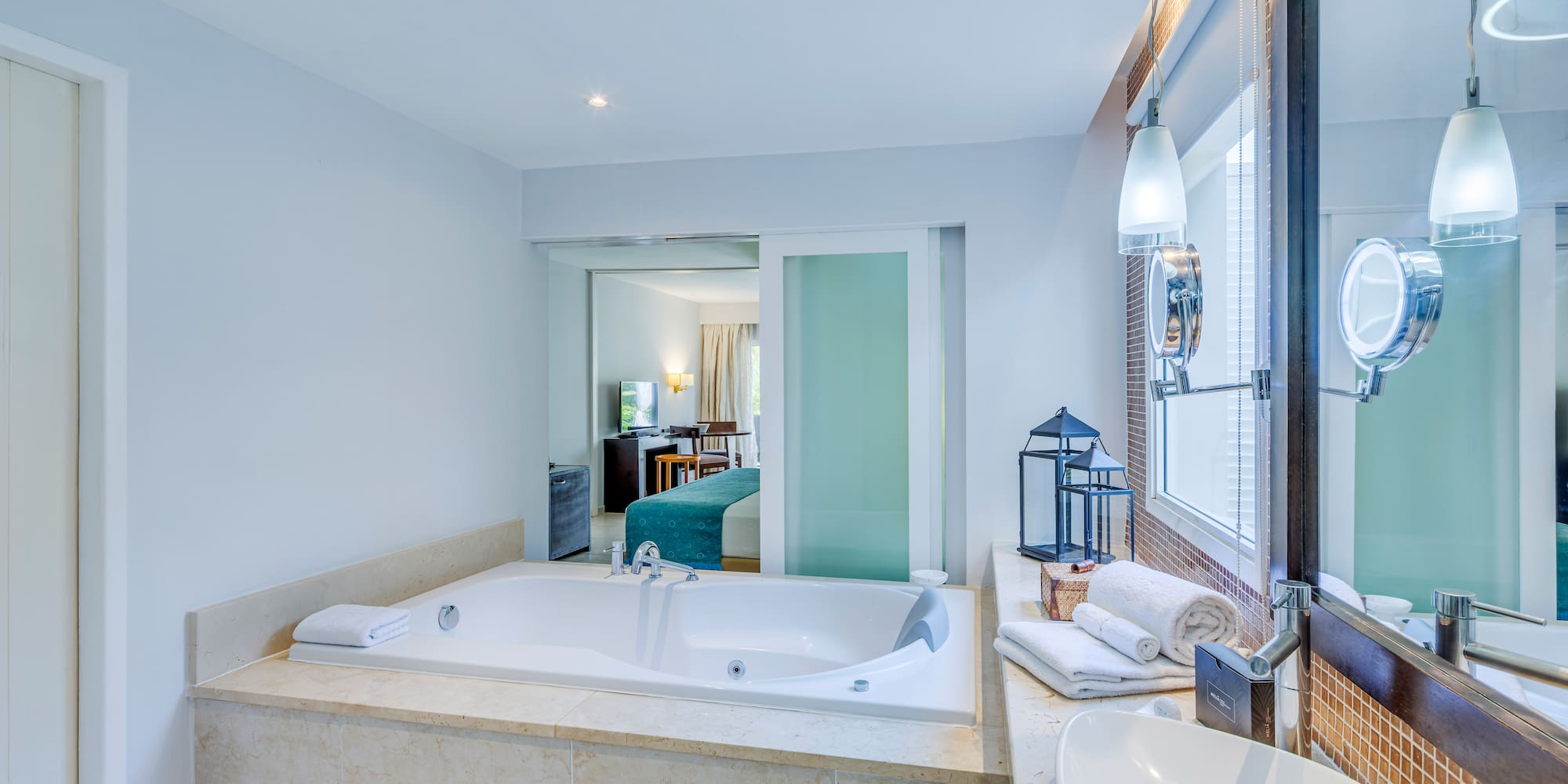 a bathroom with a bathtub and sink