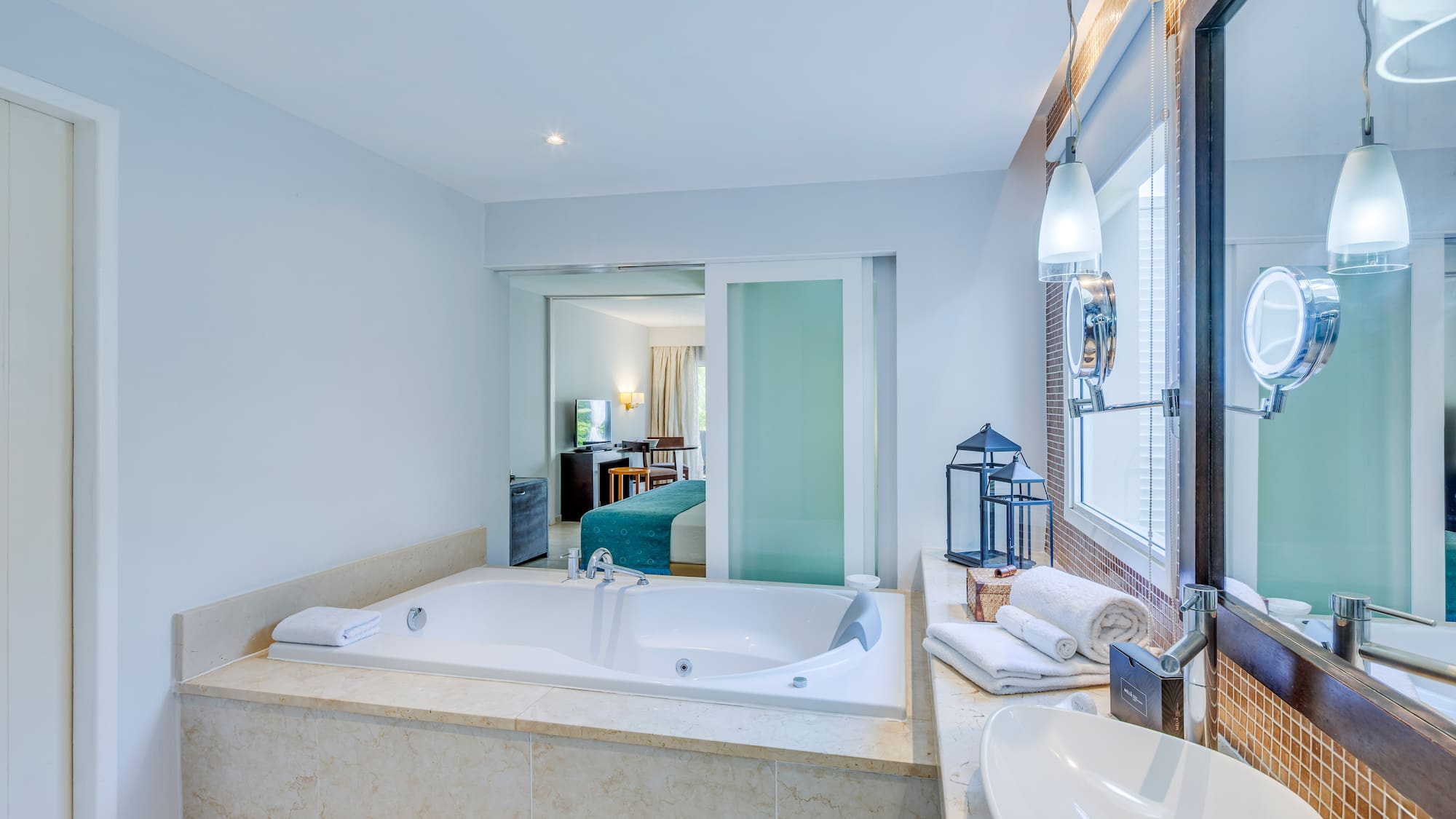 a bathroom with a bathtub and sink