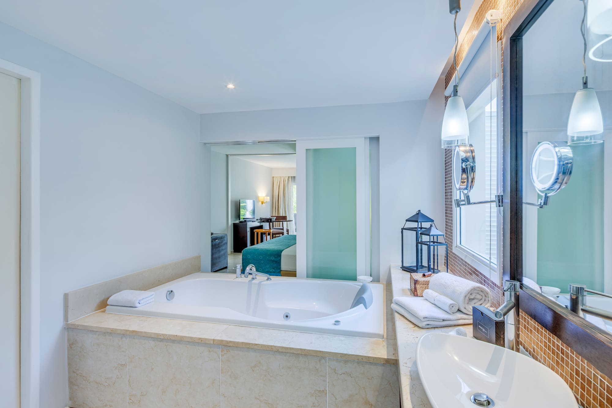 a bathroom with a bathtub and sink