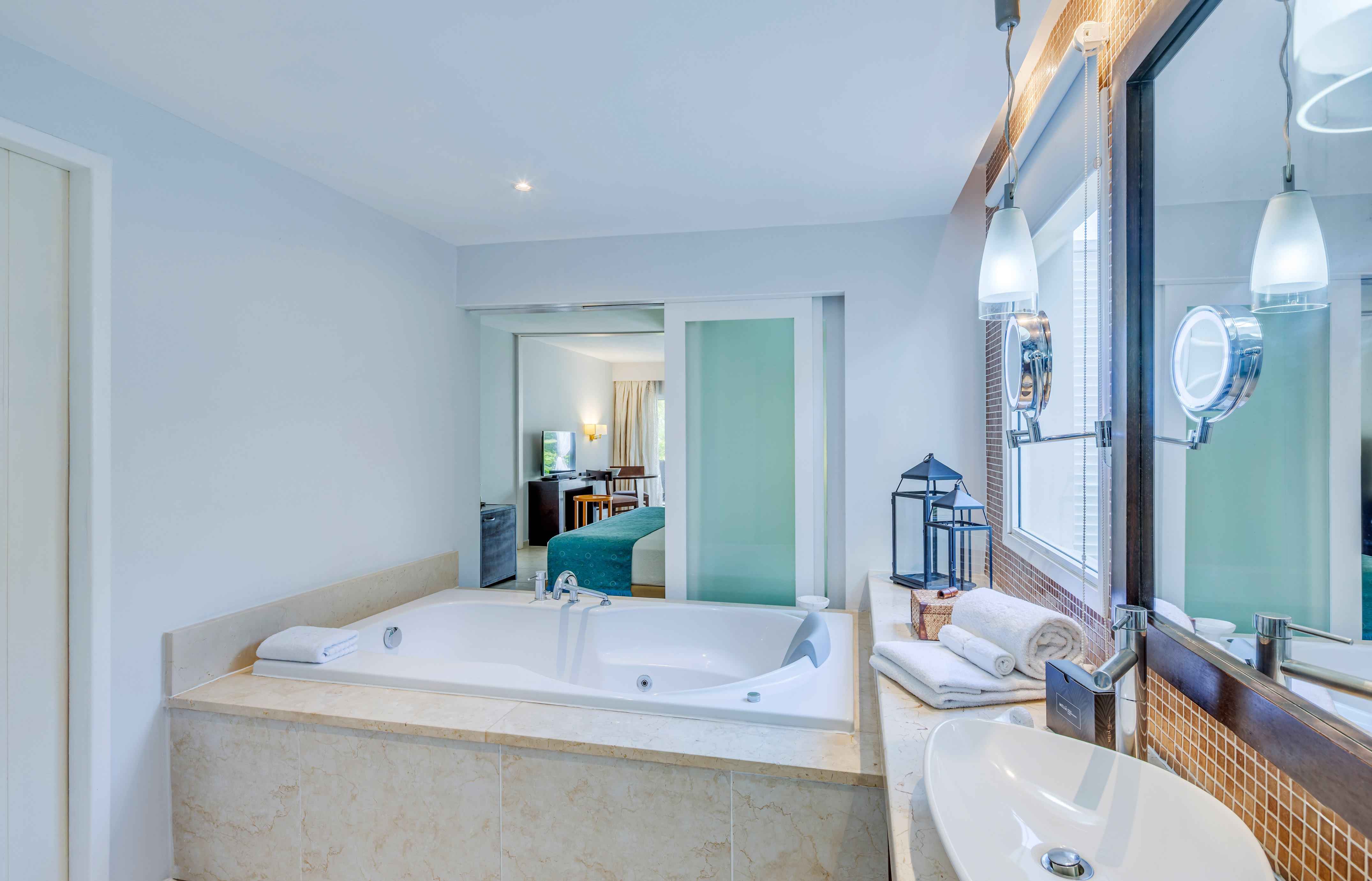 a bathroom with a bathtub and sink