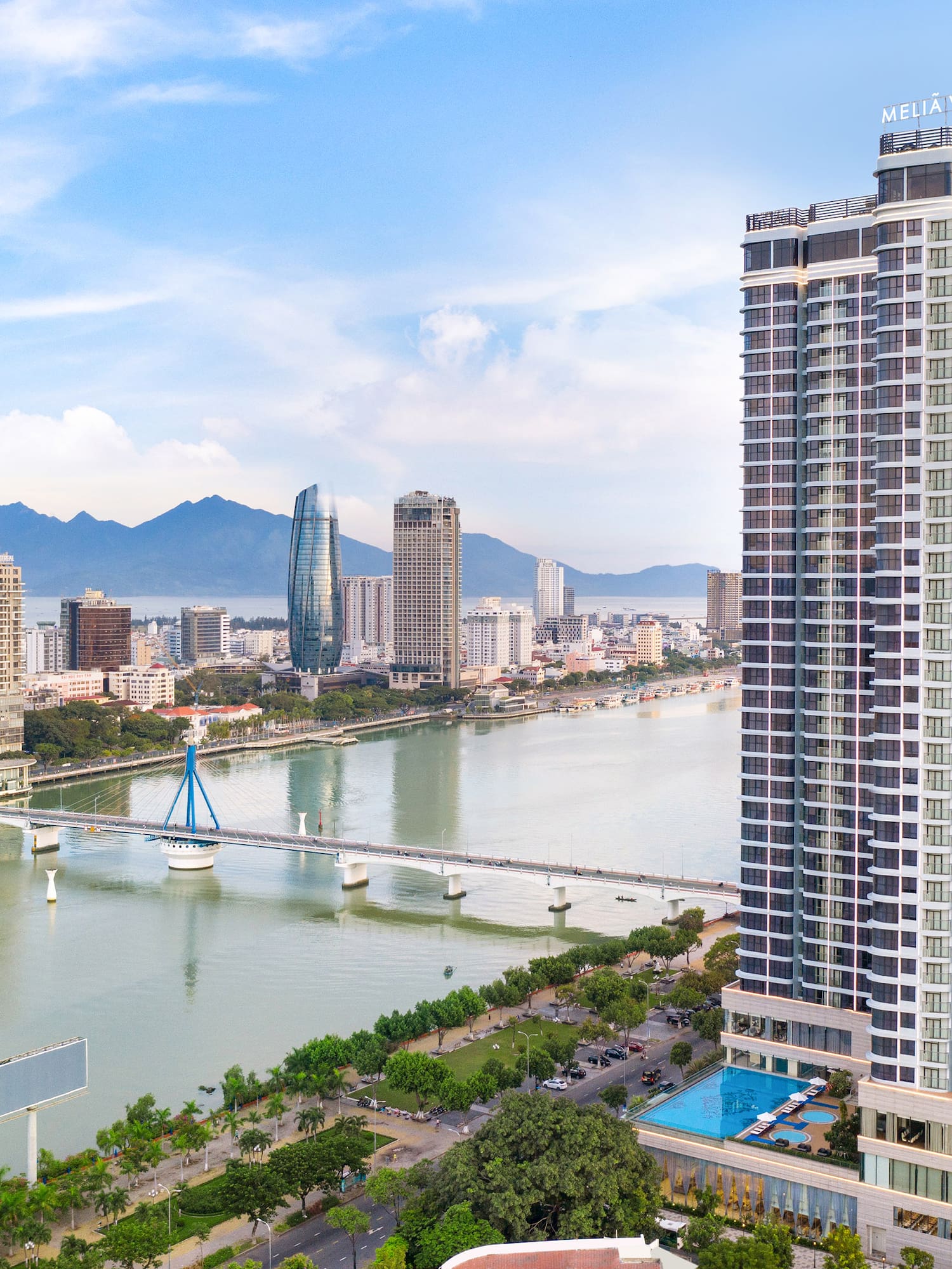 a city with a bridge and a river