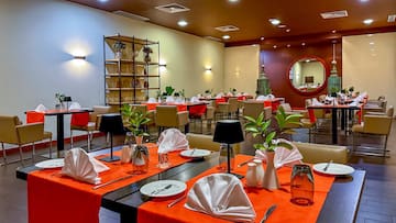 a room with tables and chairs