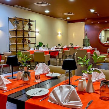 a room with tables and chairs