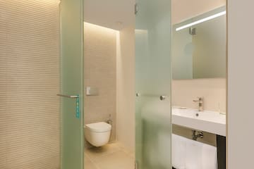 a bathroom with a glass door