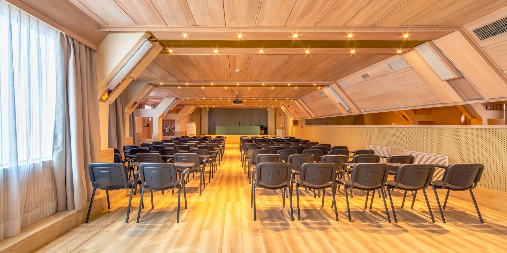 a room with rows of chairs