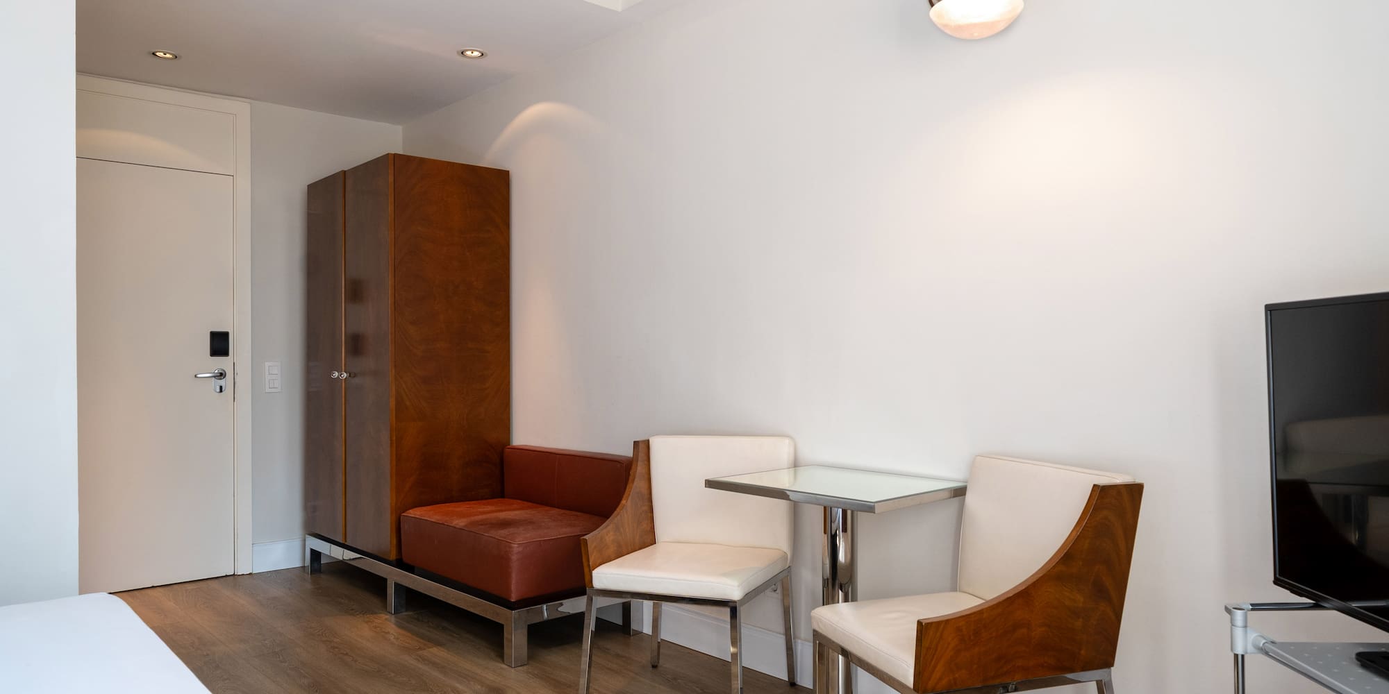 a room with a table and chairs