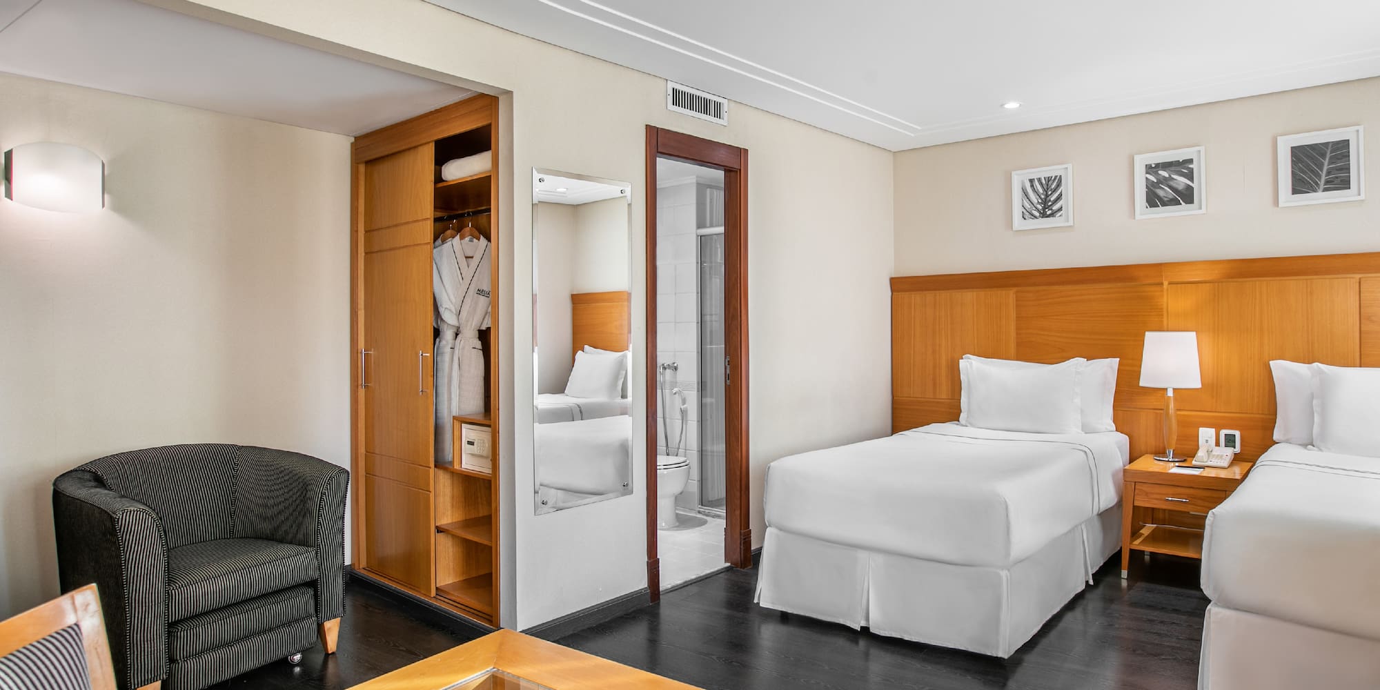 a room with a bed and a chair