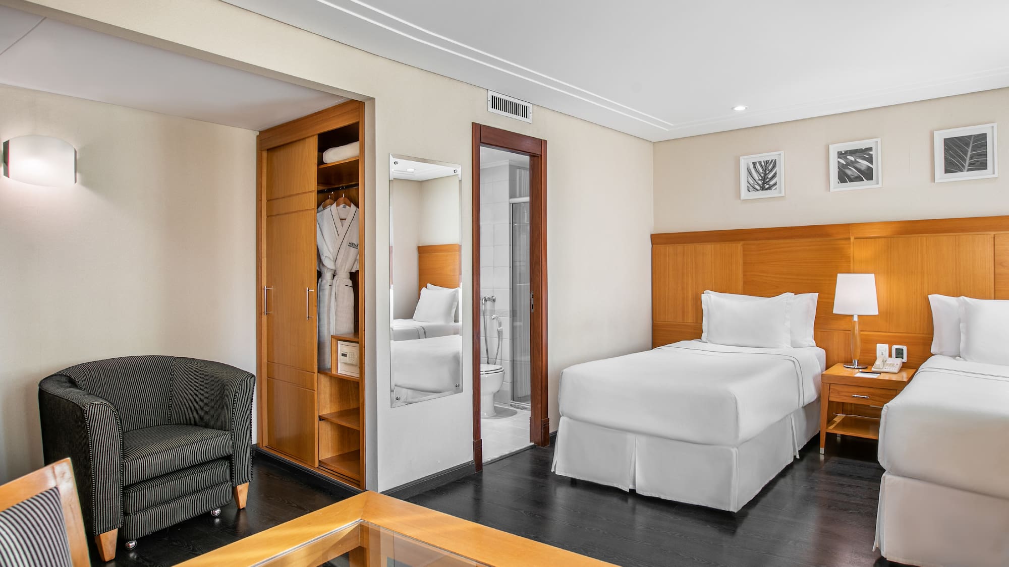 a room with a bed and a chair