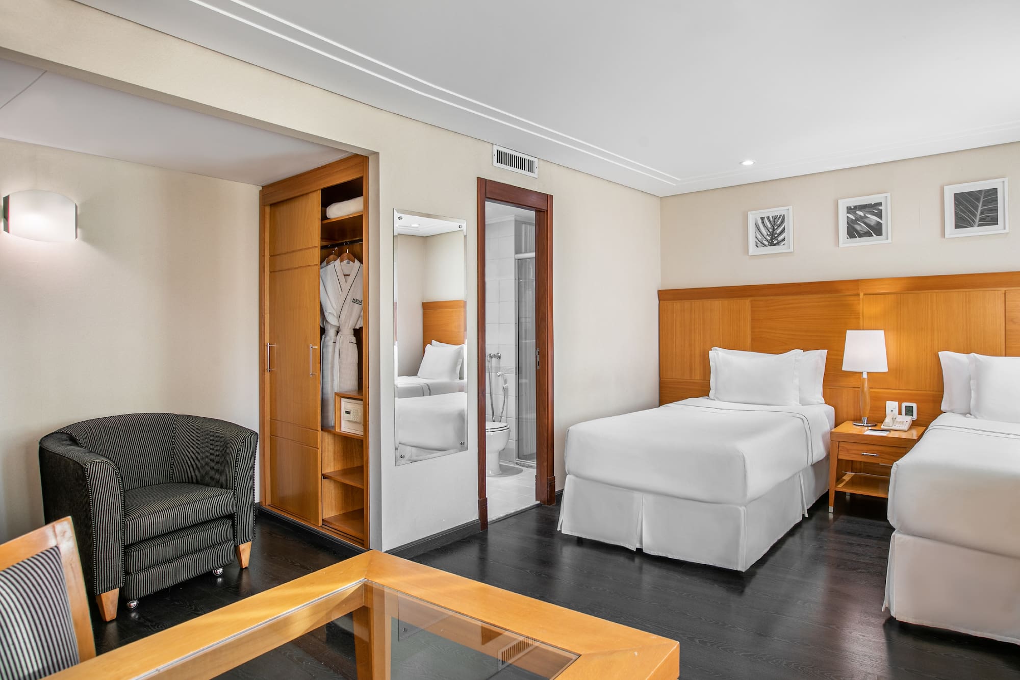 a room with a bed and a chair