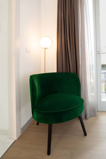 a green chair in a room