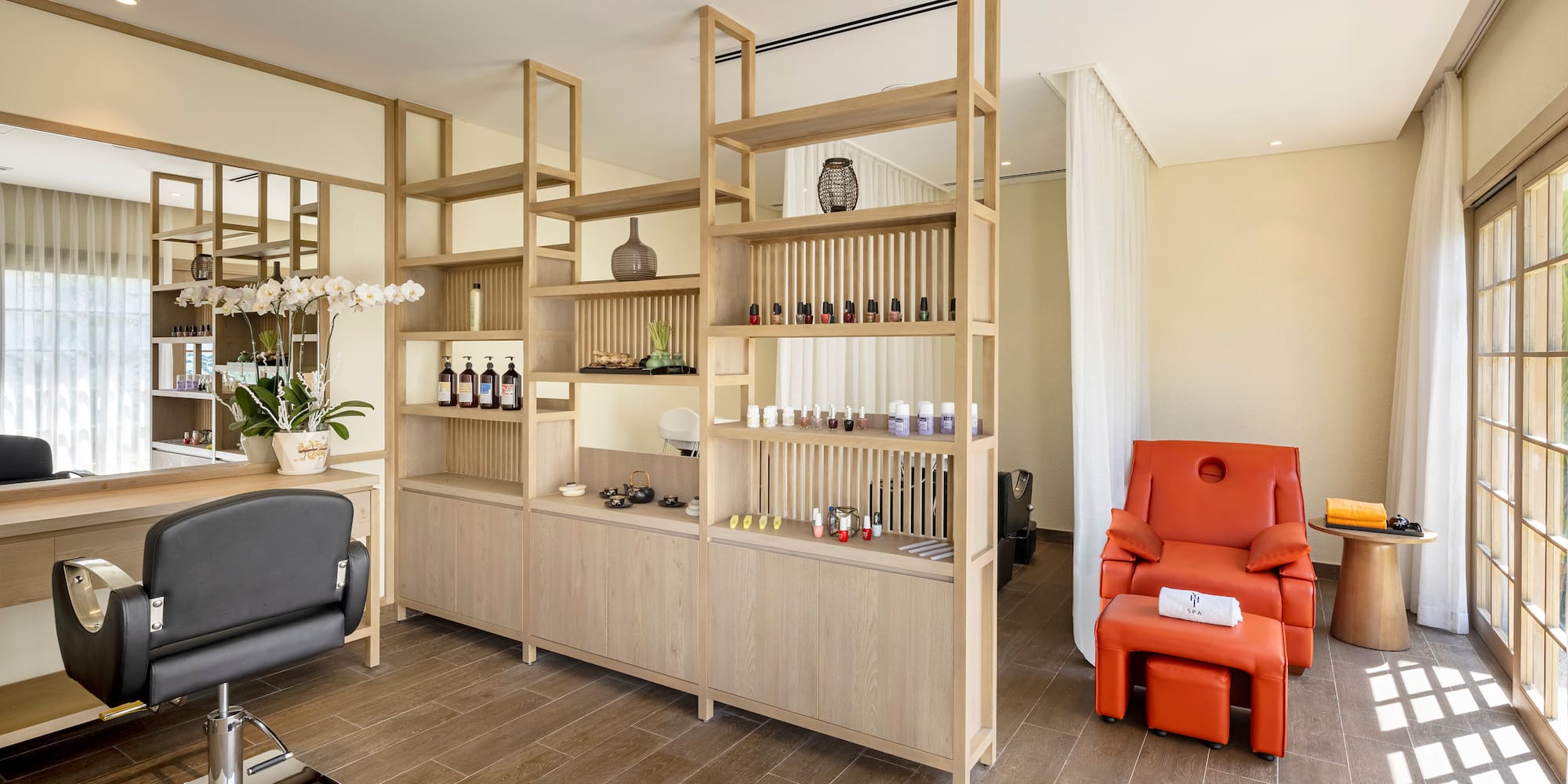 a room with shelves and a chair