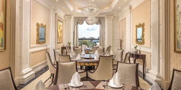 a room with a table and chairs