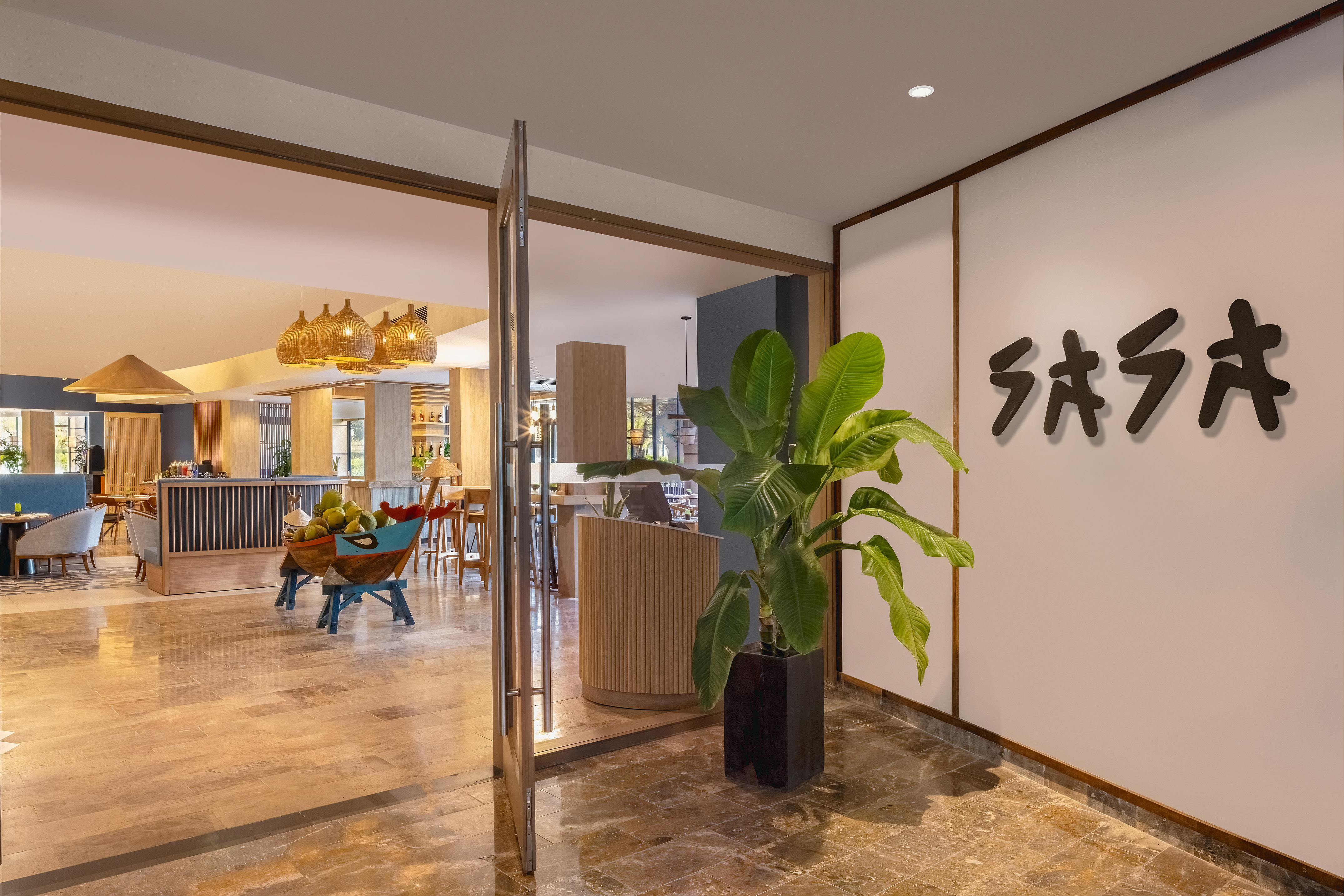 a glass door with a plant in it