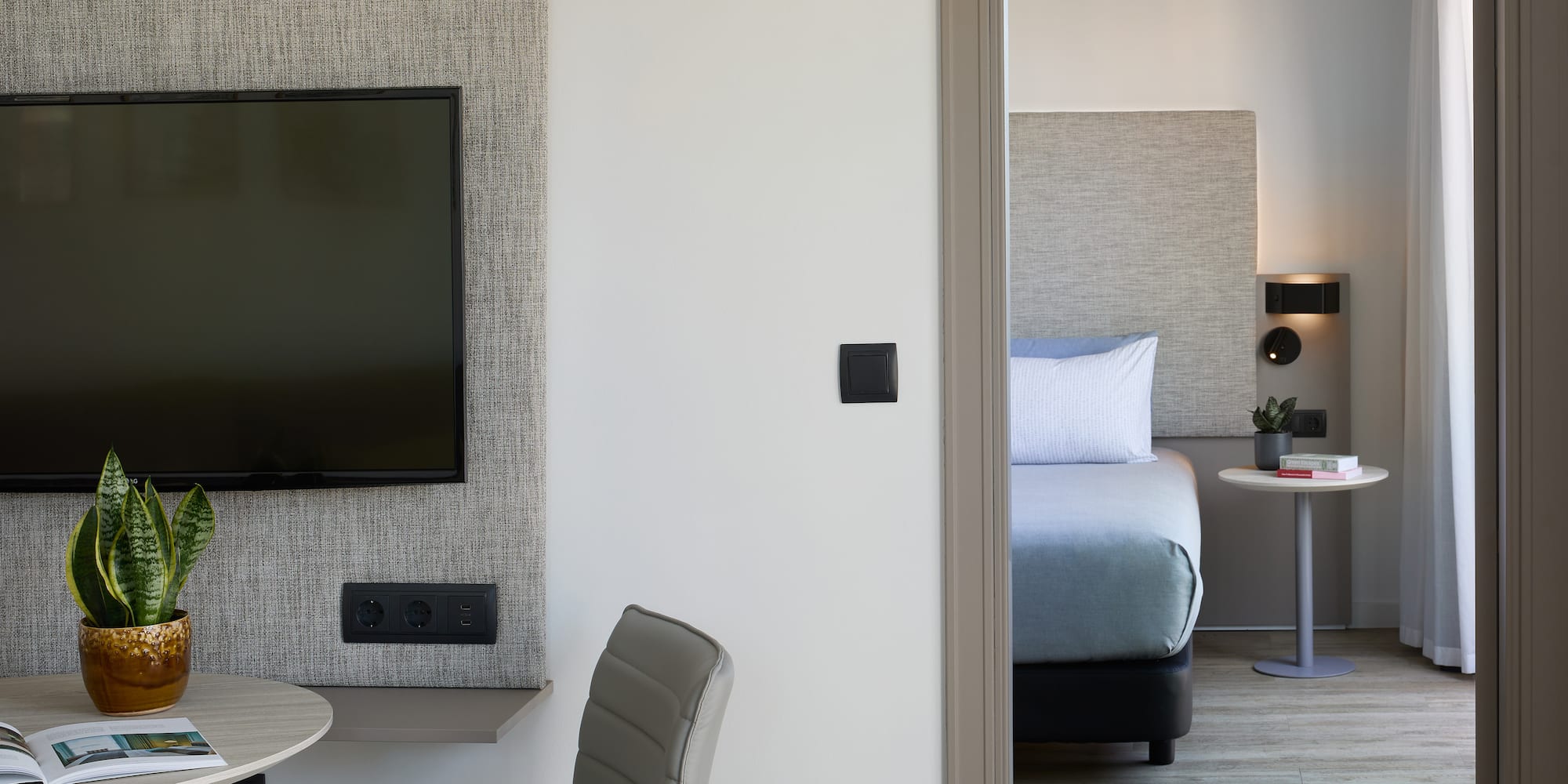 a room with a tv and a table