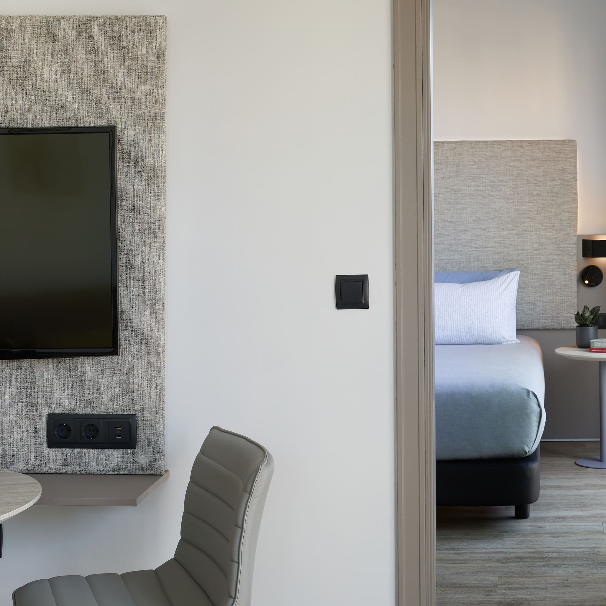 a room with a tv and a table