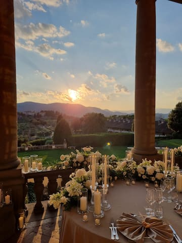 a table with candles and flowers on it