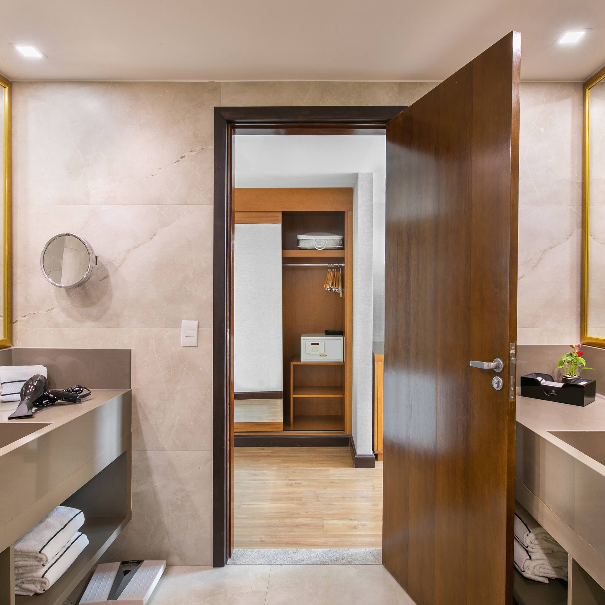 a bathroom with a door open