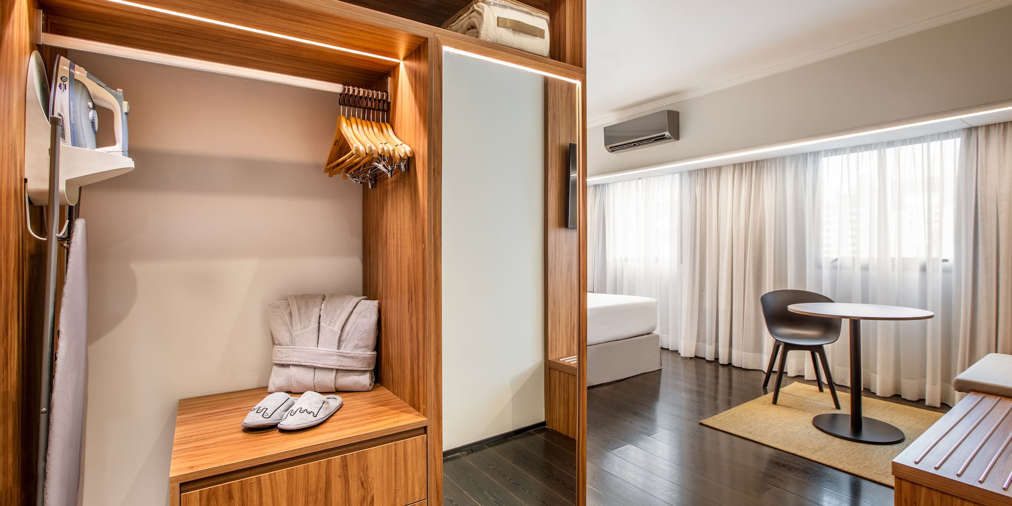 a room with a closet and a table