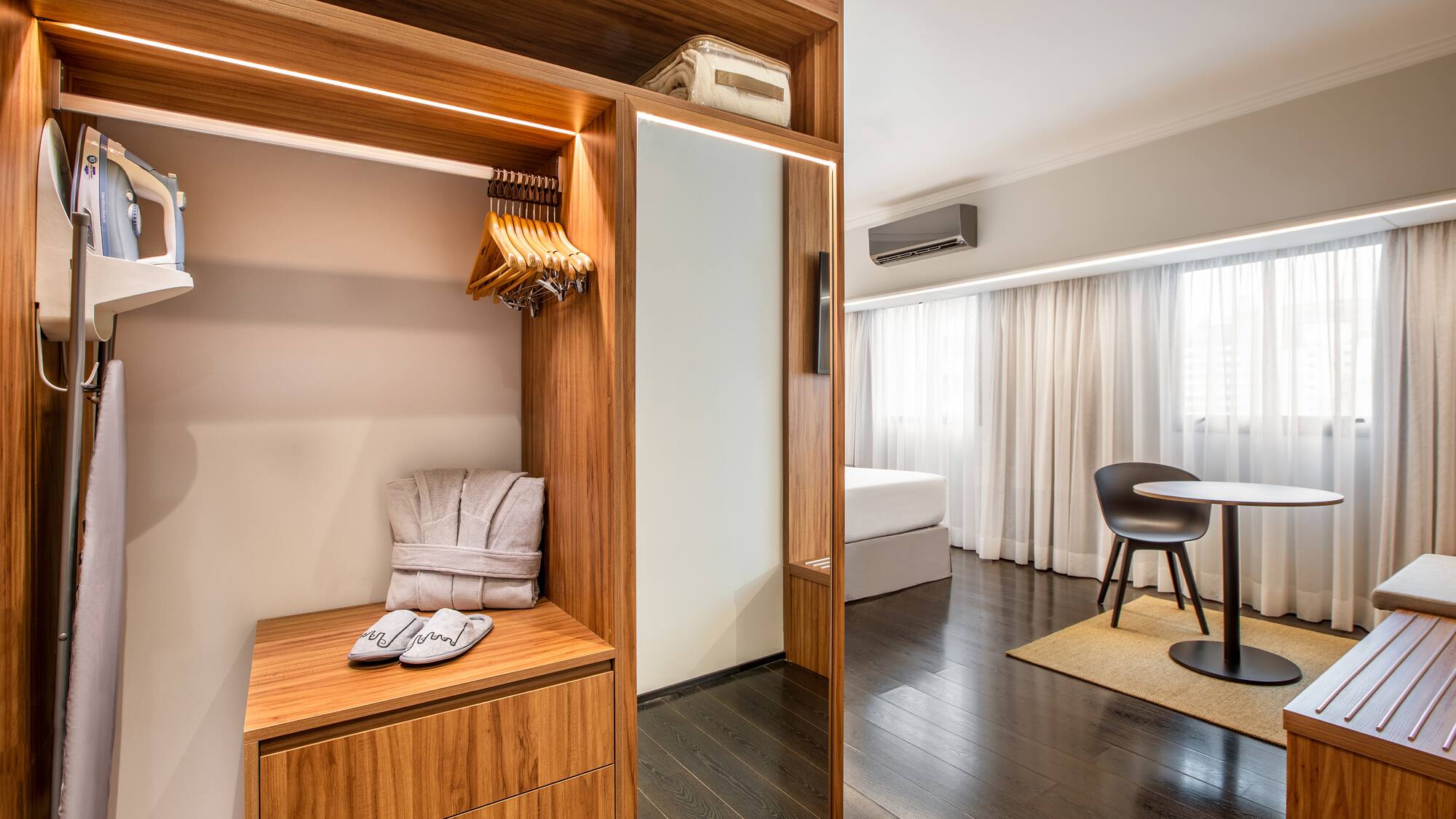 a room with a closet and a table