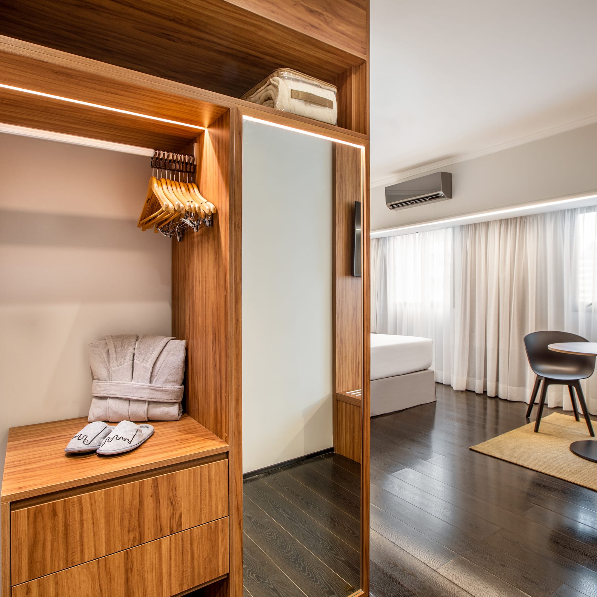 a room with a closet and a table