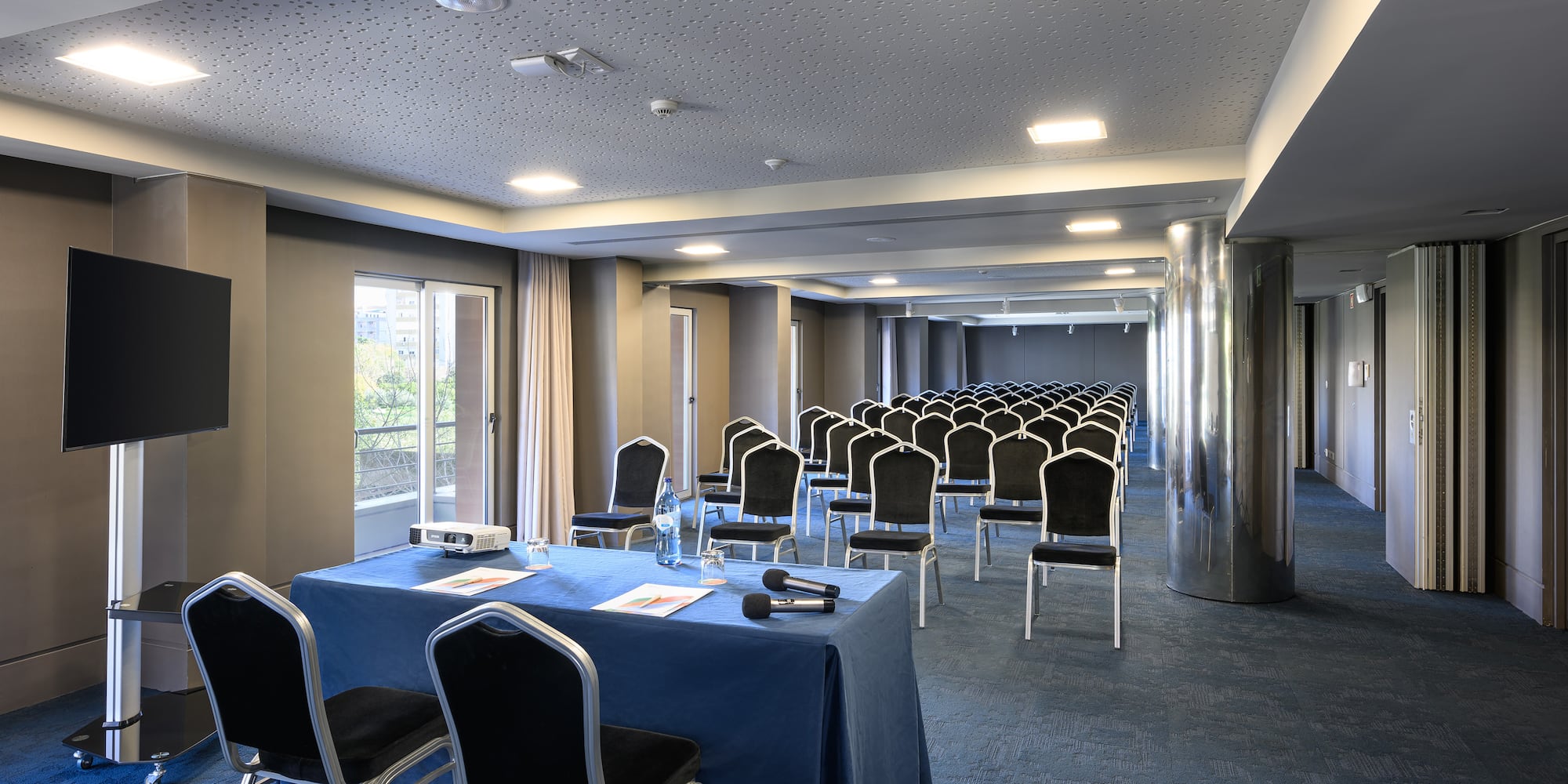 a room with chairs and tables