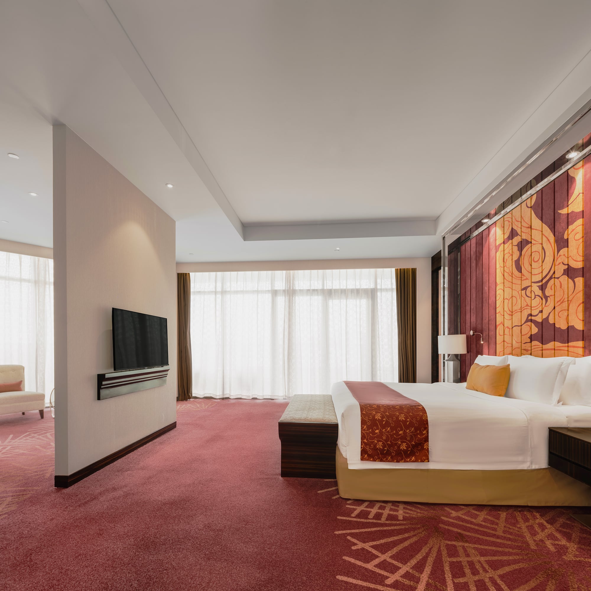 a king-size bed with TV