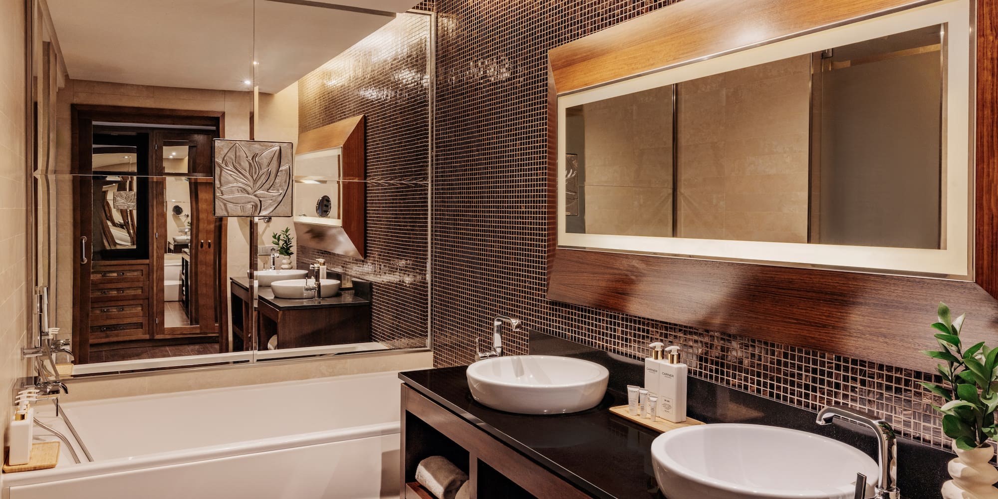 a bathroom with a mirror and sinks