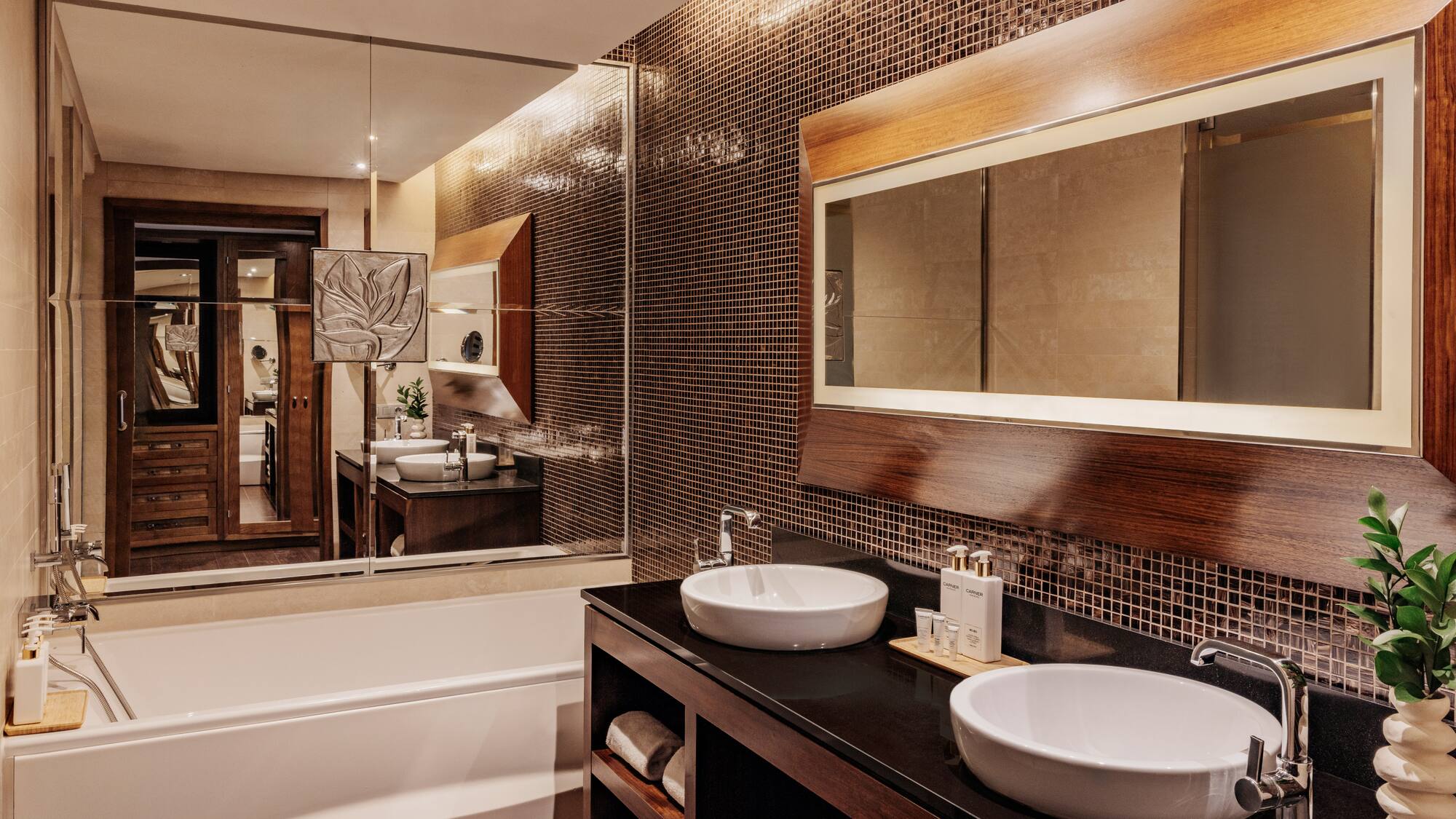 a bathroom with a mirror and sinks