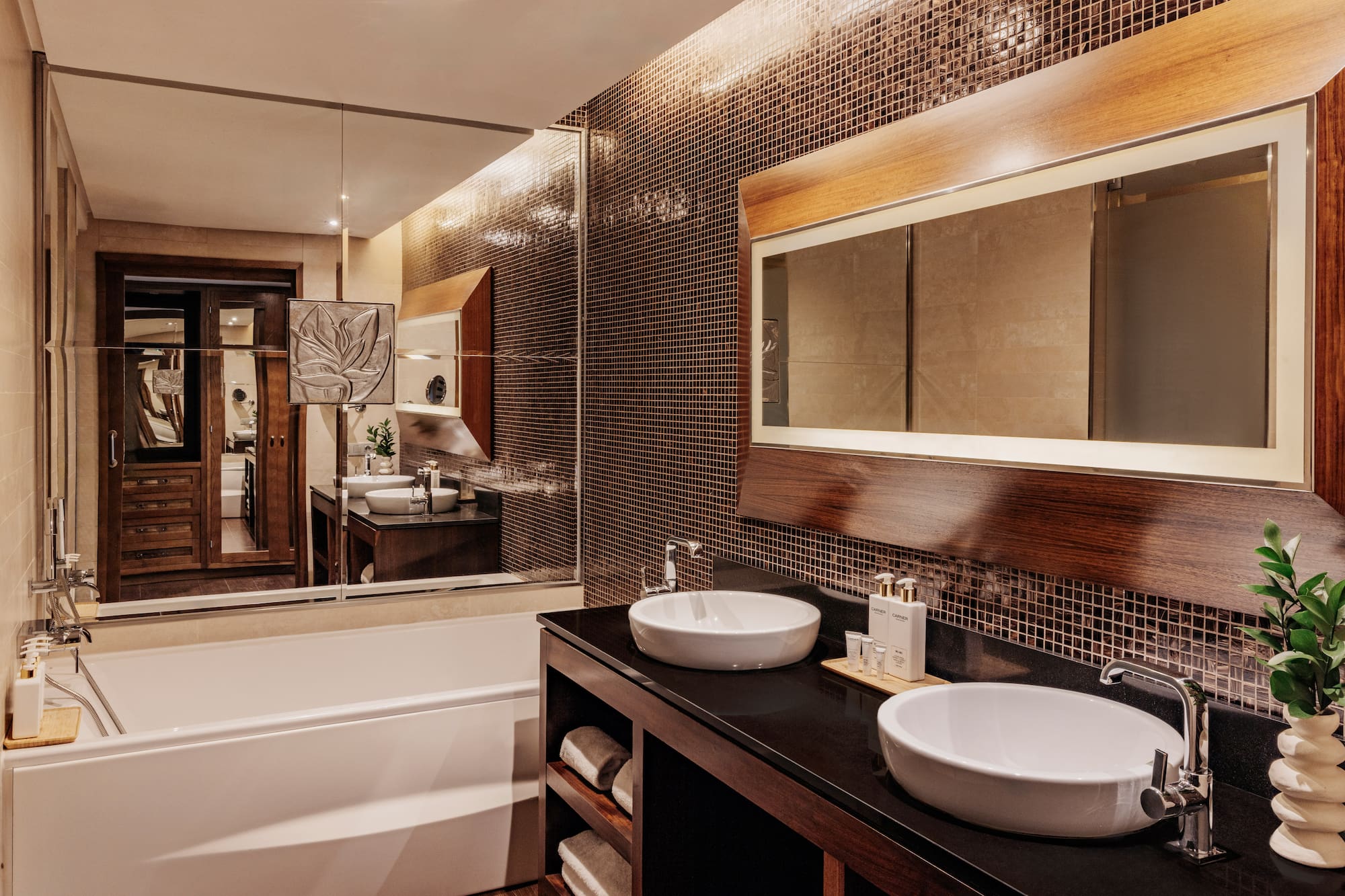 a bathroom with a mirror and sinks