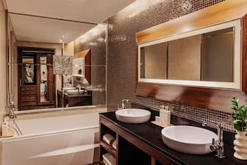 a bathroom with a mirror and sinks