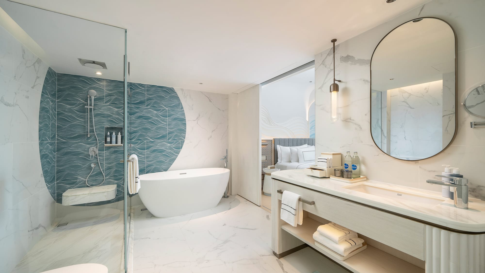 a bathroom with a tub and a shower