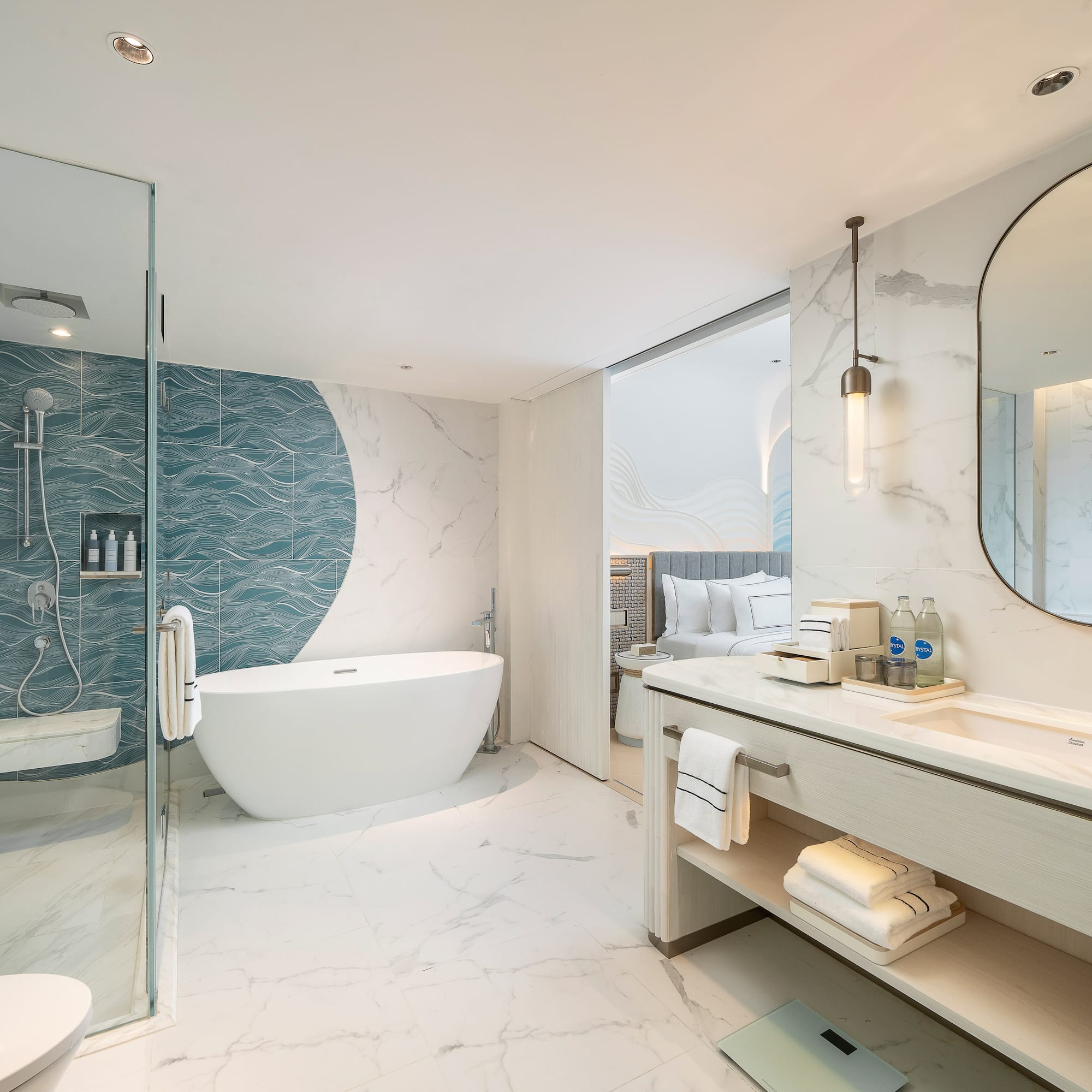 a bathroom with a tub and a shower