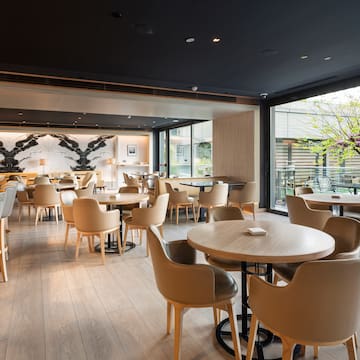 a room with tables and chairs
