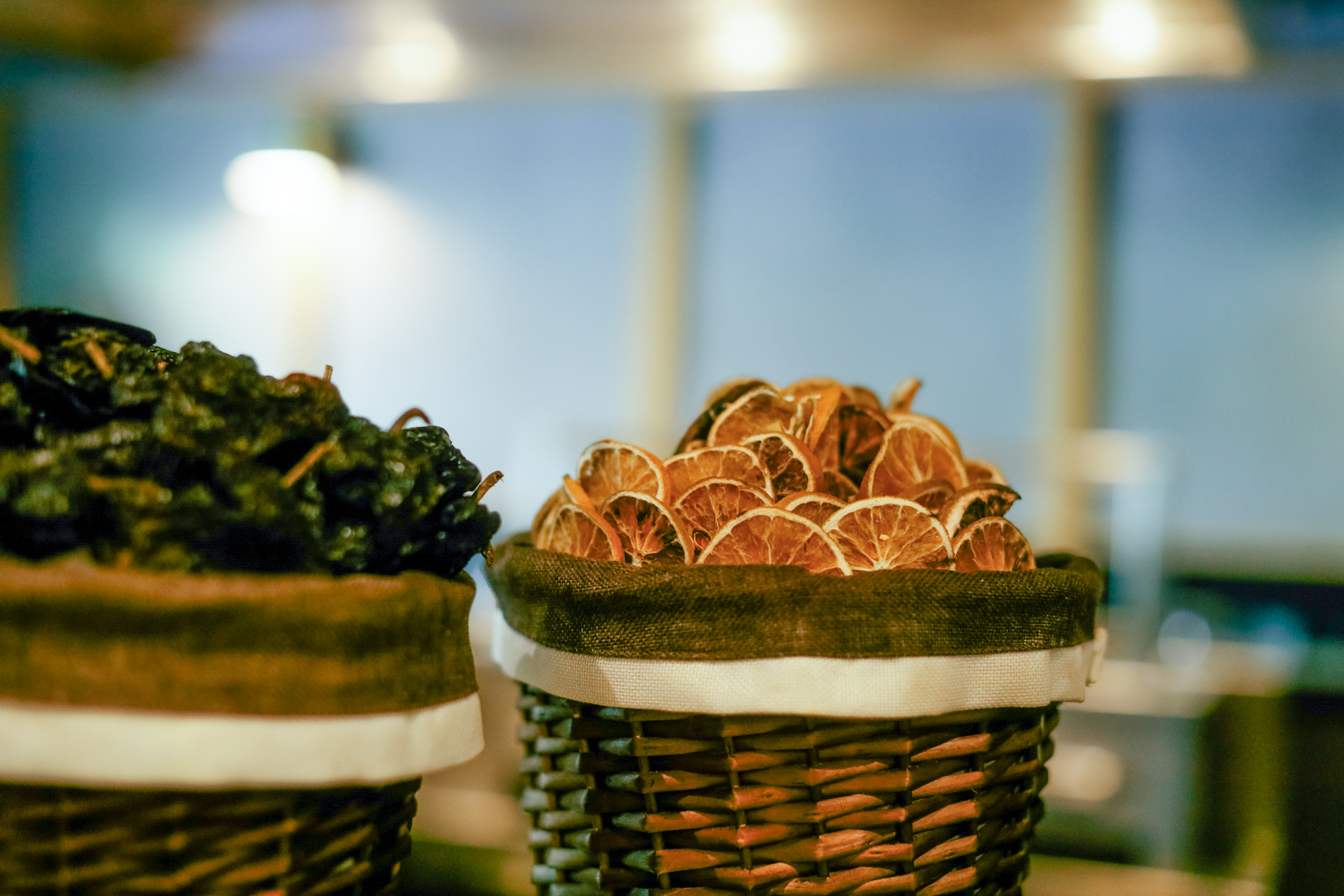 a group of baskets with dried fruit