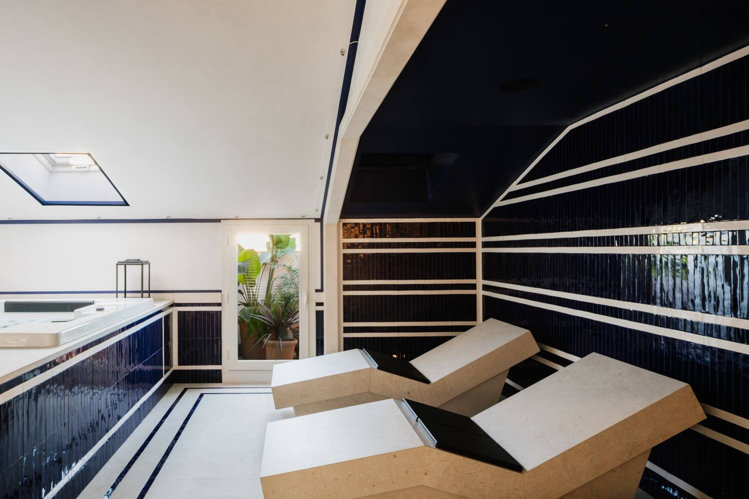 a room with white chairs and blue walls