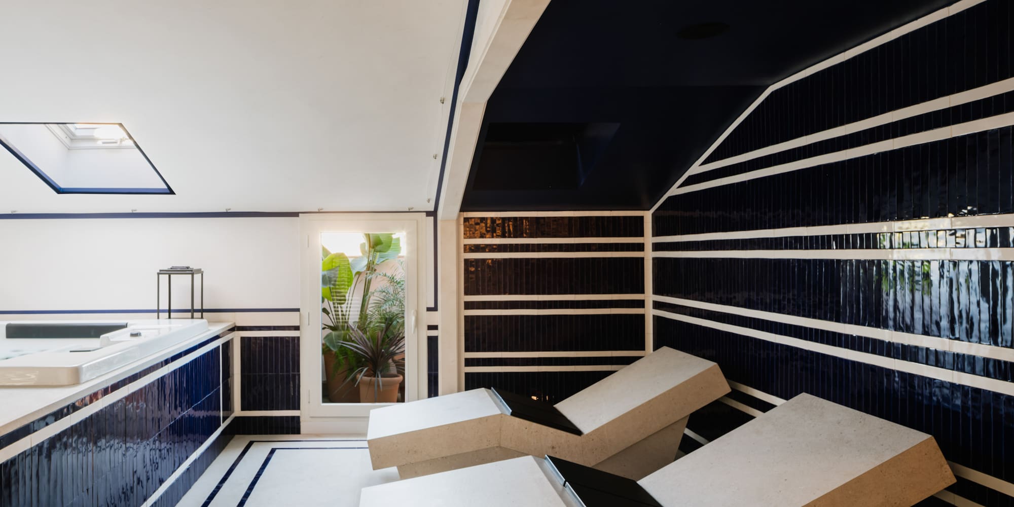 a room with white chairs and blue walls