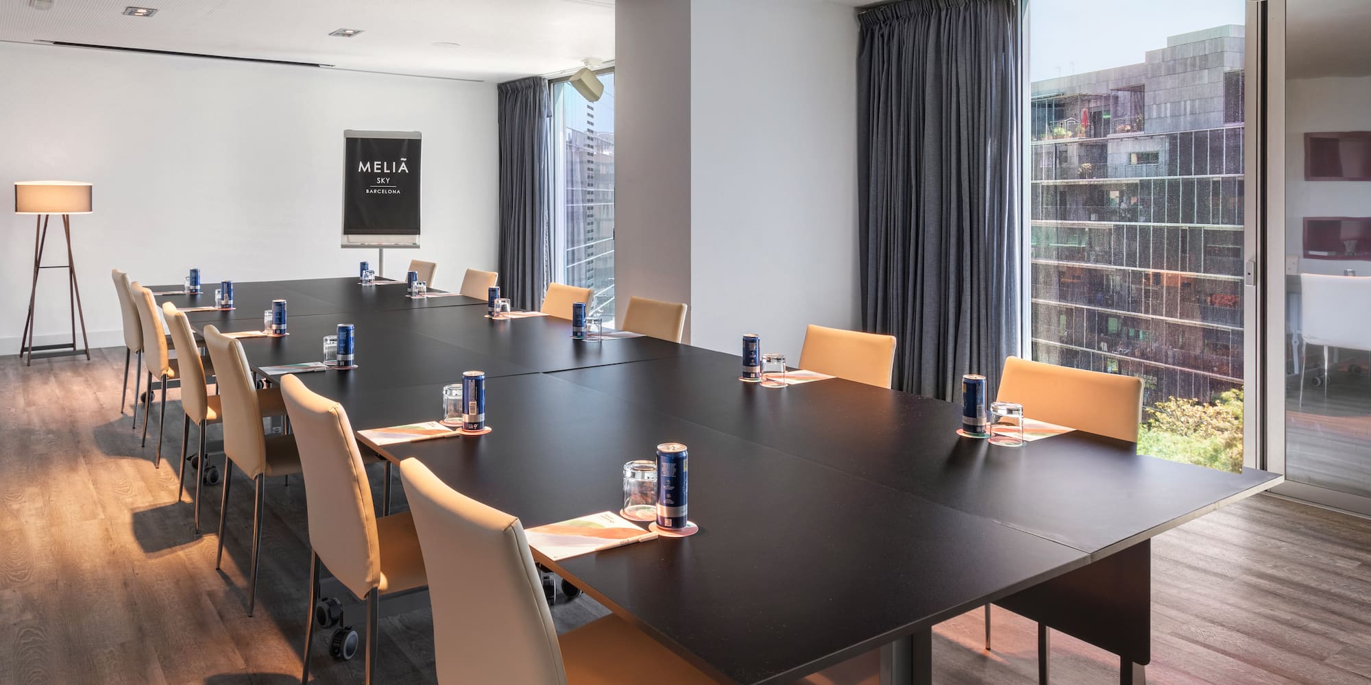 a conference room with a large table and chairs
