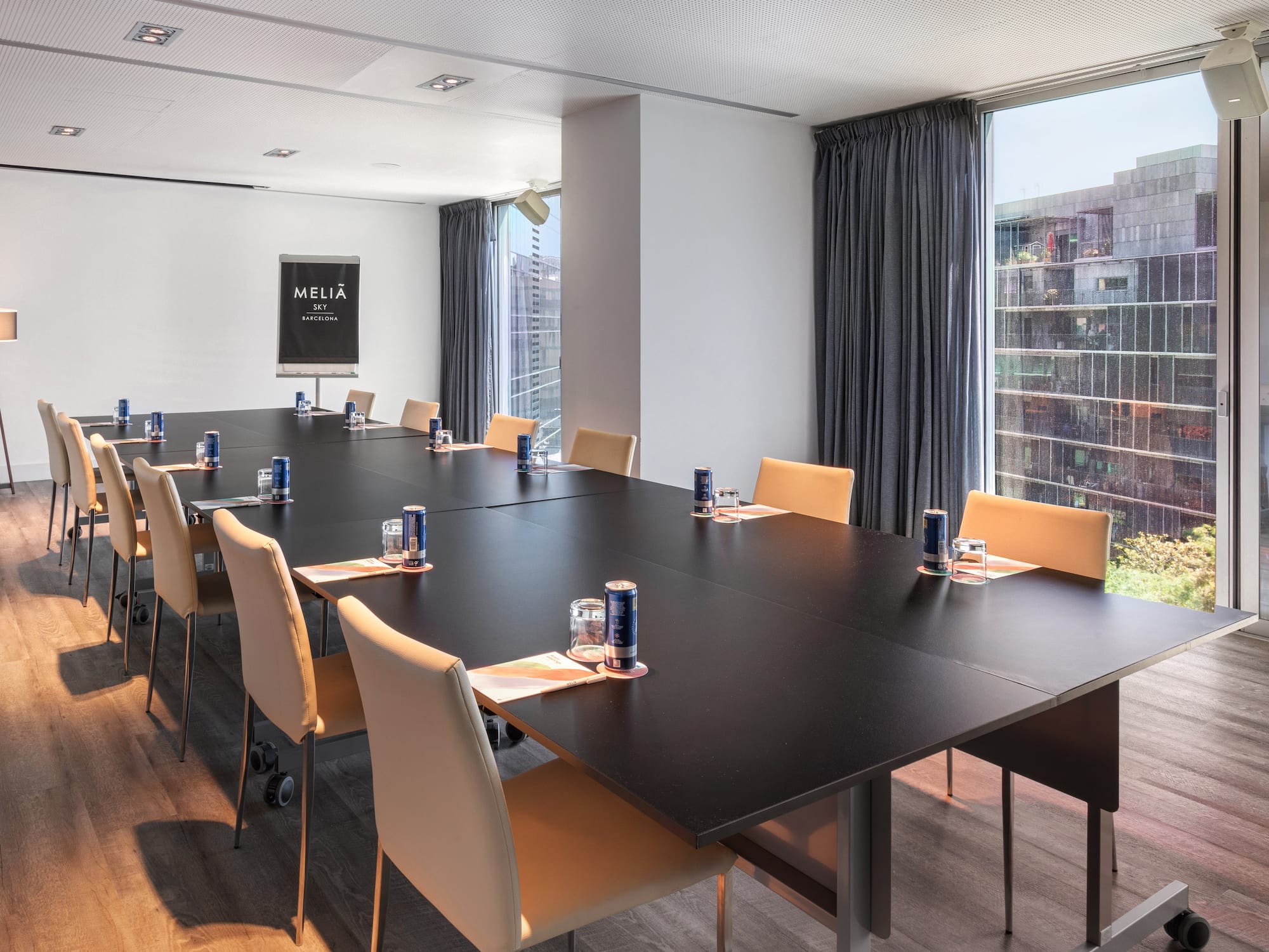 a conference room with a large table and chairs