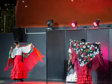 a group of women on a stage