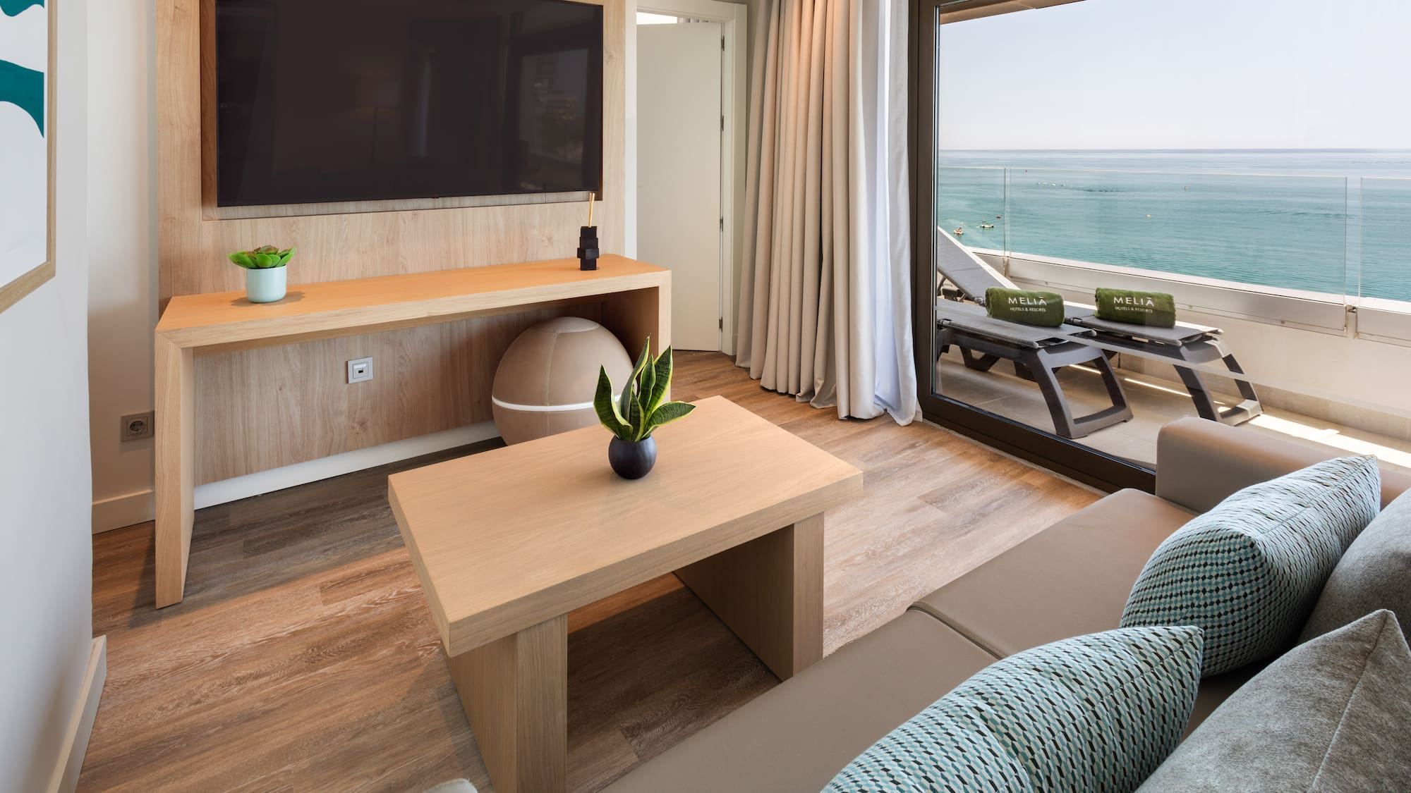 a living room with a television and a couch