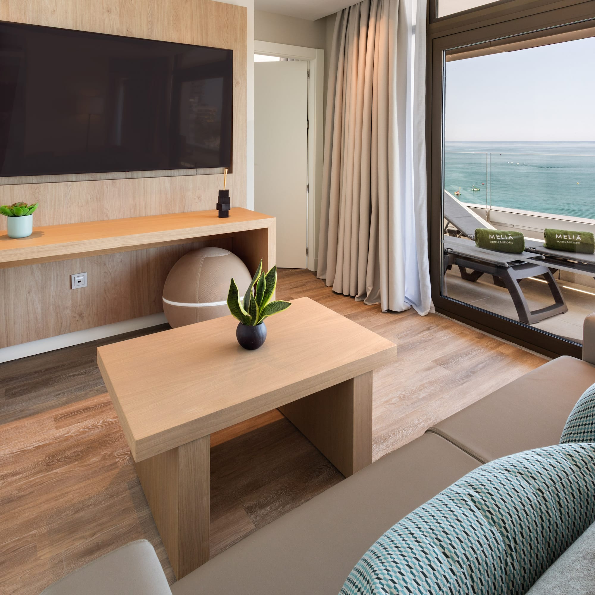 a living room with a television and a couch