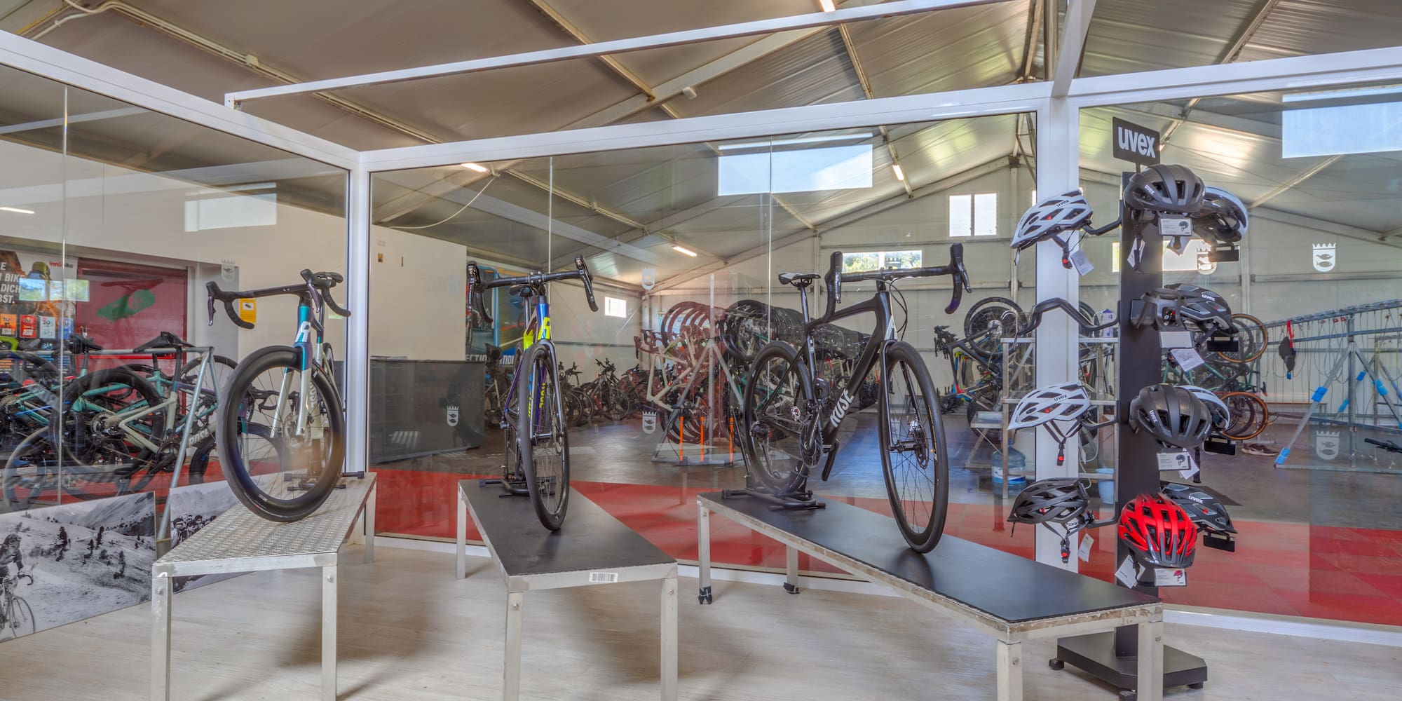 a room with bikes and helmets