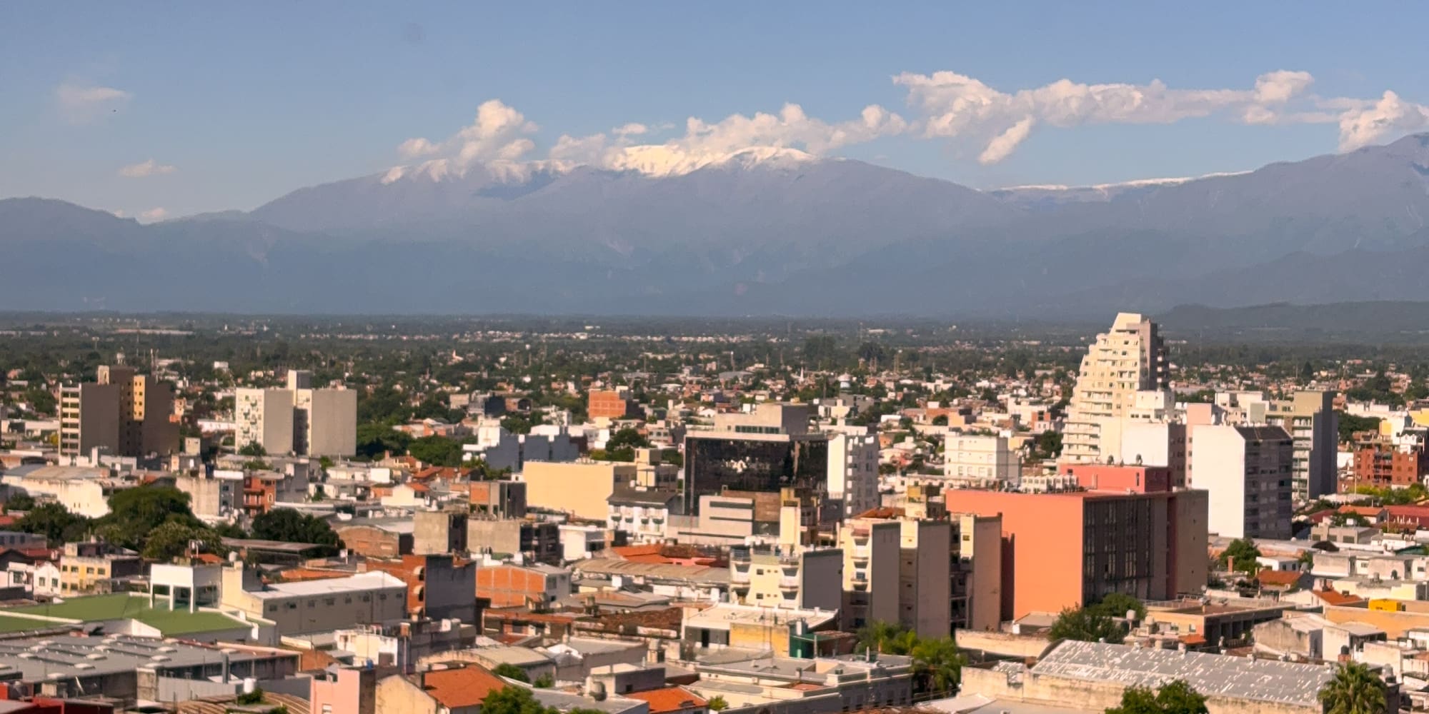 a city with a mountain in the background