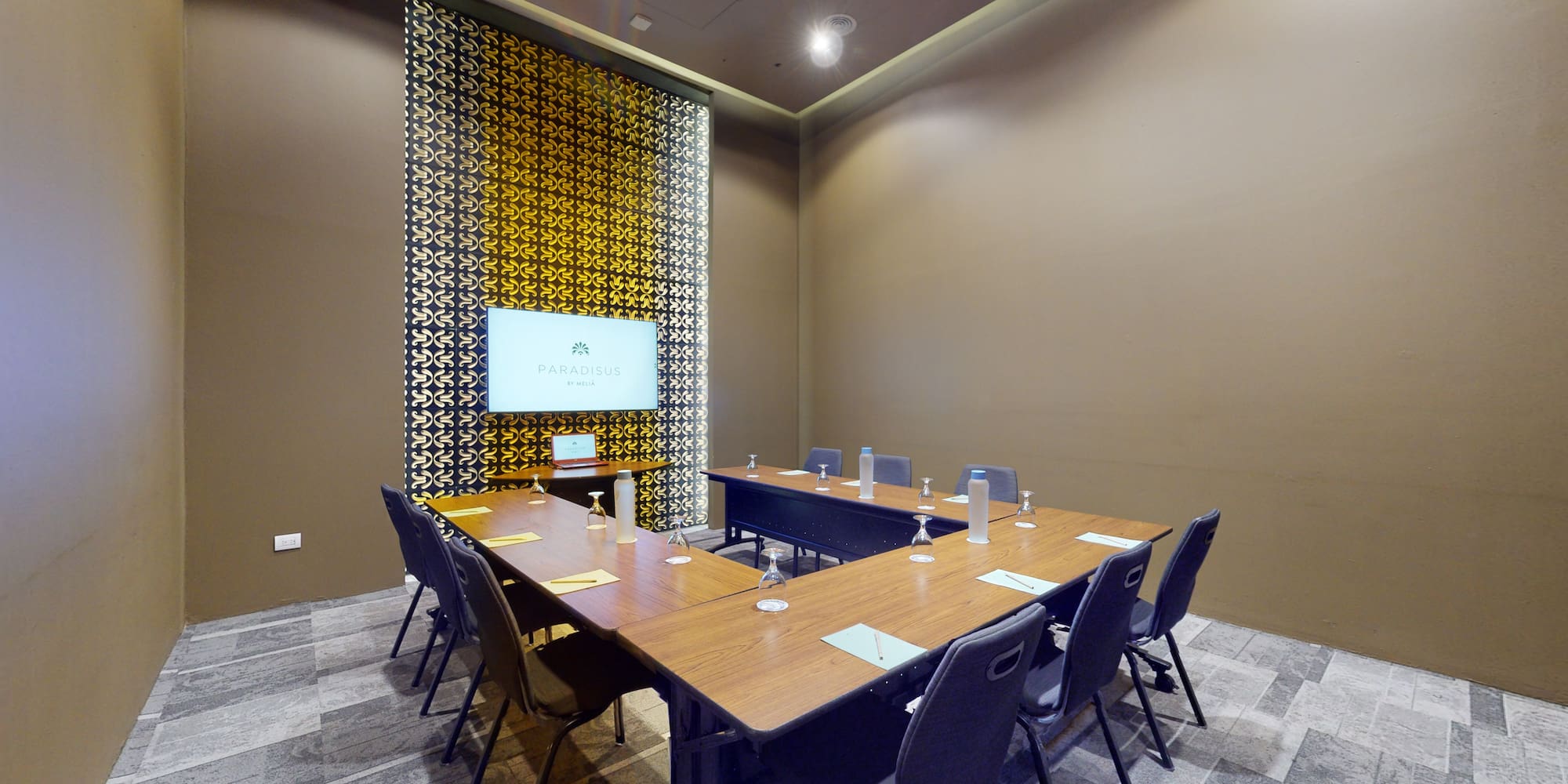 a room with a table and chairs