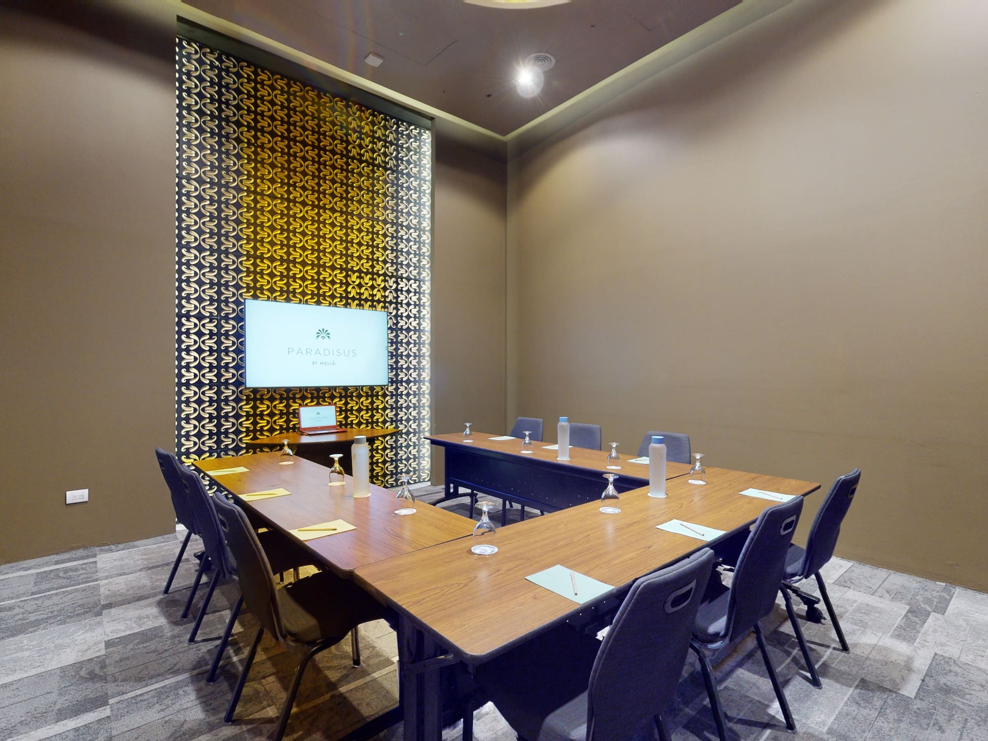 a room with a table and chairs